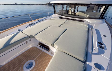 Nimbus 495 Flybridge motor yacht foredeck with grey sunpads 