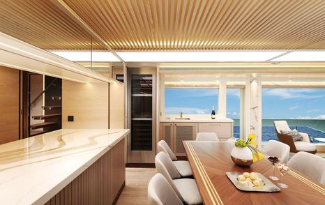 FD100 Tri-Deck Hull 13 main saloon dining table and bar area