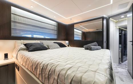Pershing motor yacht Aldebaran III guest cabin with large window 