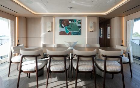 Superyacht Mustique's main saloon dining area