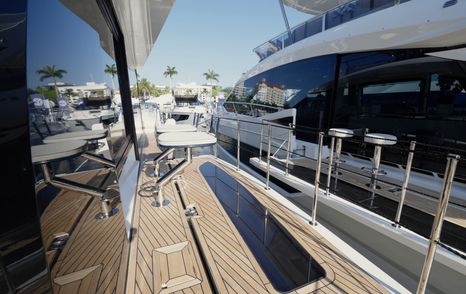 Starboard side deck aboard the Galeon 620 Fly showing the window in balcony floor