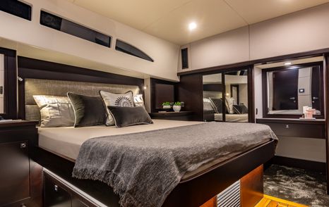 The GT60 stateroom features a queen berth