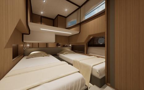 Motor yacht Greenline 42's twin cabin with beds and wood panelling