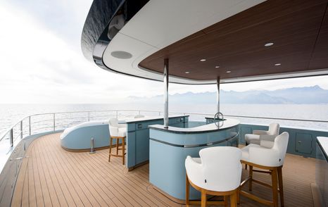 Superyacht Limerence shaded bar and seating area