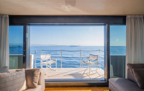 Motor yacht Le Gypsy fold down balcony with deck chairs 