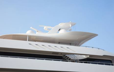 Close up of Feadship MOONRISE sundeck architecture, surrounded by clear skies