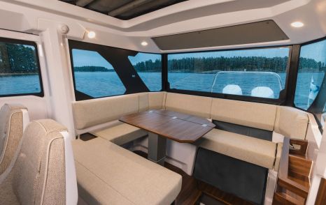 Axopar 38 XC Cross Cabin boat interior with U-shaped seating 