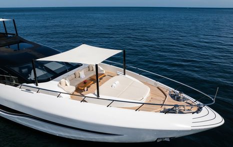 Motor Yacht Jacqpot foredeck with sunpads and alfresco dining