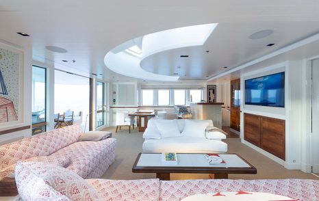 Sofas and wide screen TV in skylounge of explorer yacht Blue II