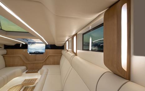 Lightly colored sofa with wooden effect light above it in interior of Onda 31L limousine tender