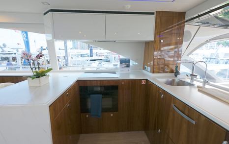 Riviera 5600 Sport Platinum Edition aft galley with hopper window