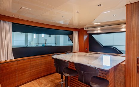 Motor yacht M&M's main saloon dining area