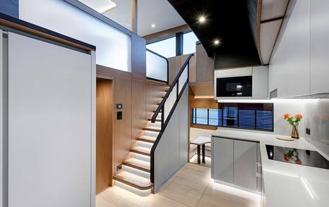 Lazzara LPC 300 Catamaran interior stairway and galley