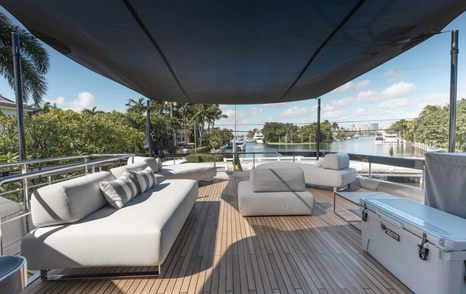 Motor yacht Beyond Beyond shaded seating on flybridge
