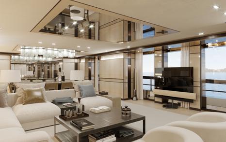 Main salon onboard Heesen RELIANCE. Cream seating arrangement on port side with widescreen TV on starboard, plus large windows around. 