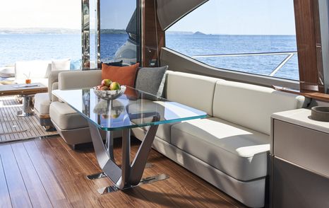 The modern interior of a Princess V78 luxury yacht