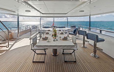 Superyacht Moonraker's uppert deck alfresco dining 