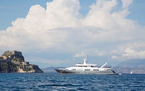 superyacht with grey hull on anchor