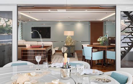 Superyacht Philosophy's main saloon sliding glass doors