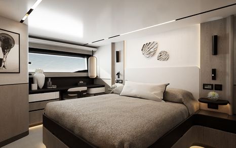 Pearl 73 midship owner’s cabin with double bed and curved cabinetry