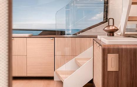 Rendering of Fountaine Pajot FPY120 catamaran interior staircase 