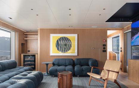 Explorer Yacht Cabana skylounge blue seating and wooden chair 