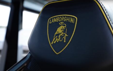 Close-up of Tecnomar Lamborghini 63 seat stitching of Raging Bull logo