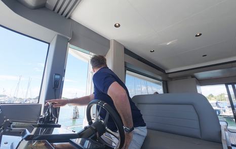 Sirena 48 lower helm during close-quarters marina manoeuvring