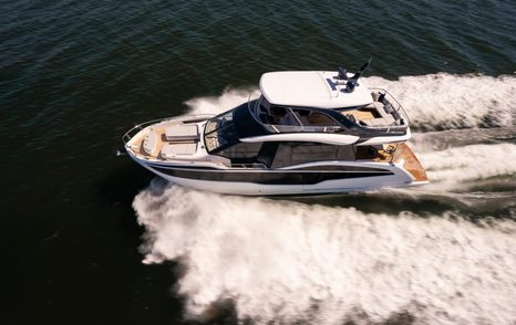 The Galeon 620 Fly underway showing the yacht’s Tony Castro-designed profile and asymmetrical layout.