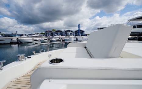 Beneteau Grand Trawler 63 adjustable foredeck backrests creating a relaxed seating area underway