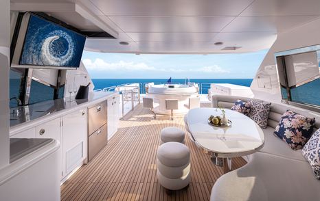 Horizon FD80 Hull 15 motor yacht sundeck with shaded alfresco dining