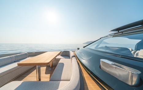 Invictus TT550 motor yacht foredeck with curved seating