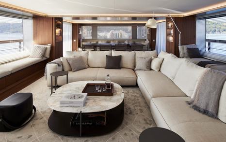 Rendering of Sanlorenzo 500 Exp's main saloon with L-shaped sofa