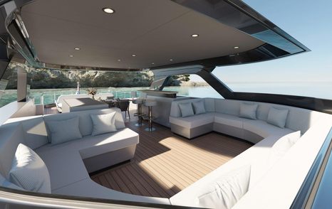 The lounge and bar space aboard the Adventure 780 is vast, and features a U-shaped sofa finished in a bright white fabric