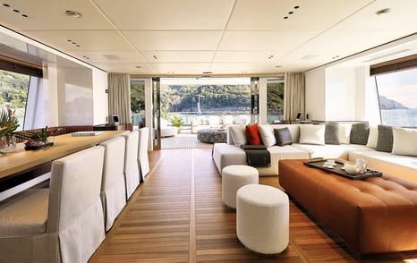 Light and airy interior on Benetti Oasis 40M with large windows and doors