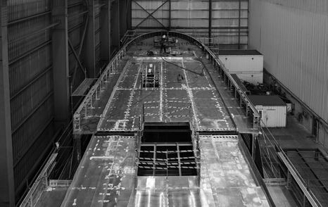 Superyacht Sea Rover foredeck under construction in black and white 