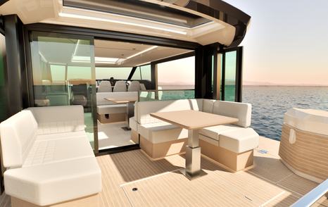 Saxdor 460 GTC boat aft deck with modular white seating 
