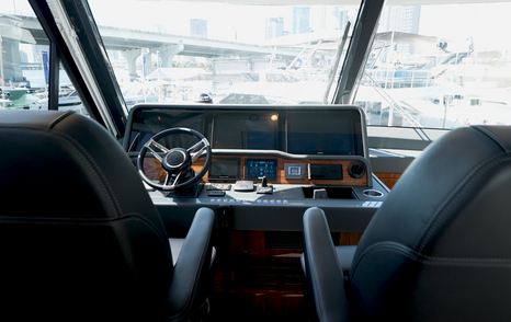 Riviera-58-Sports-Motor-Yacht-Helm-view-through-seats