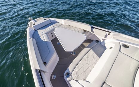 The bow seating onboard the Axopar 29 CCX is finished in a pleated, grey material