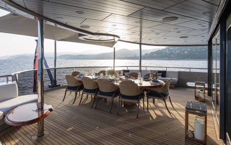 Superyacht Vibrance main deck shaded alfresco dining