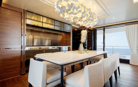 Horizon FD90 Skylounge motor yacht saloon dining area 