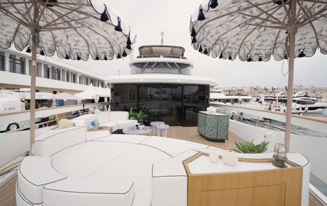 Sirena 118 owner’s foredeck terrace looking aft beneath parasols