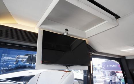 Galeon 520 Fly saloon ceiling with drop-down television in main lounge area