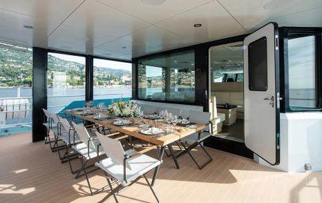 Support yacht Five Oceans aft deck al fresco dining
