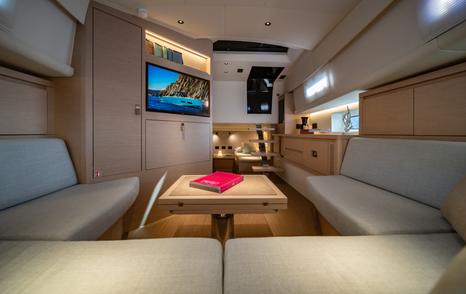Pardo Yachts Pardo 42 motor yacht dinette with mounted TV