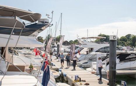Pontoon with lines of berthed motor yachts at Swanwick Marina