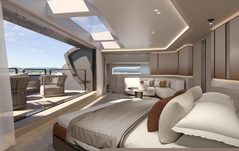 Overview of Owner's cabin onboard the Extra Yachts VILLA X30 catamaran. Berth in foreground with seating in background and balcony to port side with exterior seating.