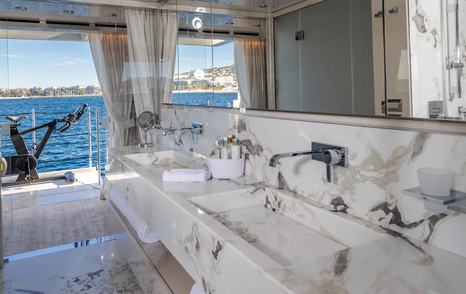 Marble twin sink with sea views on superyacht Amorcito