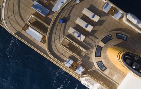 View from above of sunbeds on deck of explorer yacht Blue II