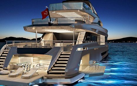 Aft view of Virtus 47m on water at night